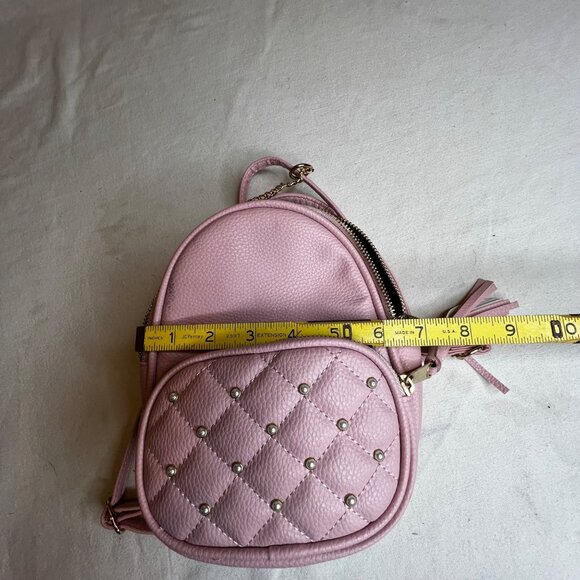 Pink Quilted Mini Backpack With Tassel Accents & Adjustable Strap By Claires - Picture 12 of 16
